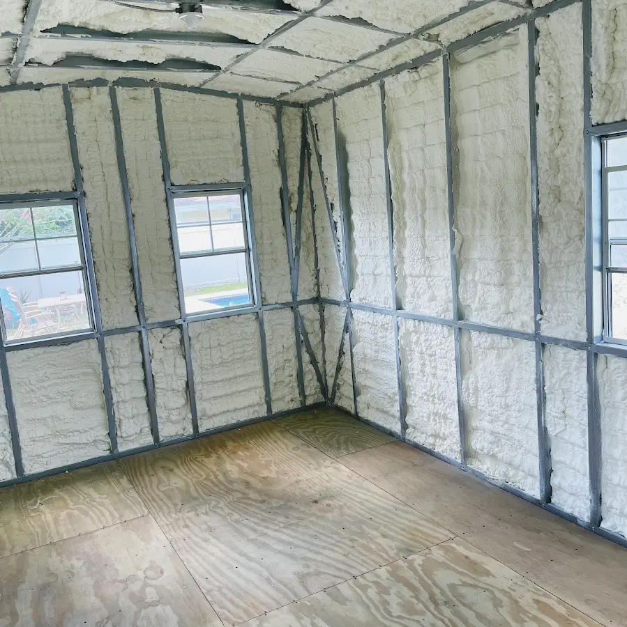Closed-cell spray foam insulation applied to wall cavities in a residential project in Willingboro